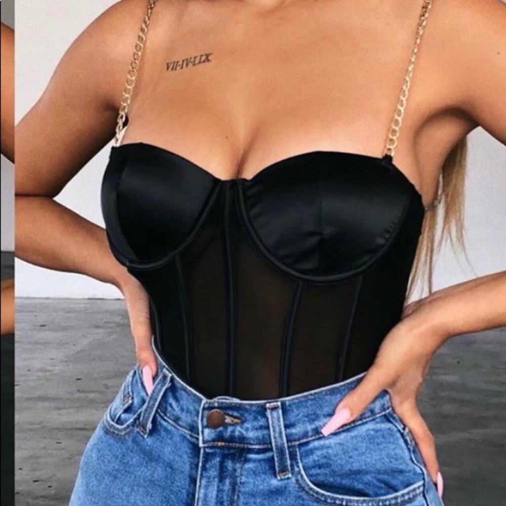 A black bodysuit perfect condition brand new!!